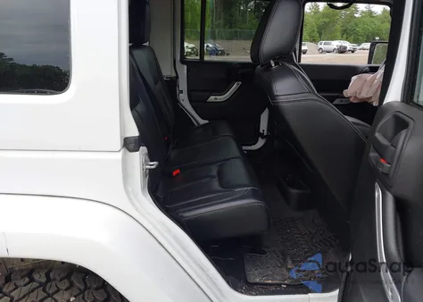 2015 Jeep Wrangler Unlimited Sahara z USA, uszkodzony, nr VIN 1C4BJWEG8FL562167